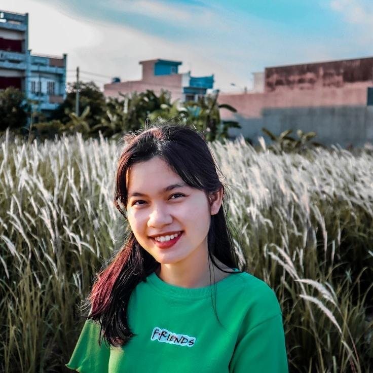 Kaveri Mehta, Lead Design Curator at Tranquil Mountain View, reviewing corporate floral arrangements